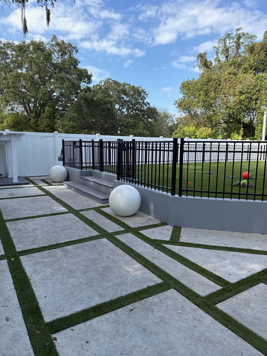 Secure outdoor play area at the Orange County Doberman facility